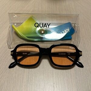 Quay Sunglasses. Orange lense with black frame.
